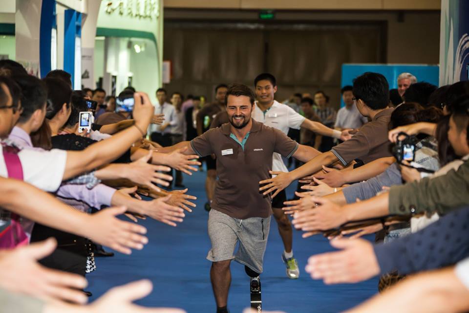 London 2012 Paralympic gold medallist Heinrich Popow was greeted enthusiastically by crowds at the Ottobock Healthcare running clinic in Zhengzhou ©Facebook