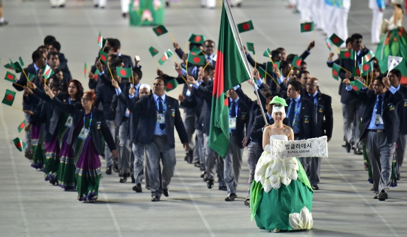 Bangladesh's Abdullah Hel Baki leads out the team ©AFP/Getty Images