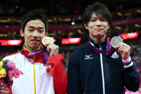 Kai Zou (left) and Kohei Uchimura, pictured at London 2012, will go head to head together again this evening ©Getty Images