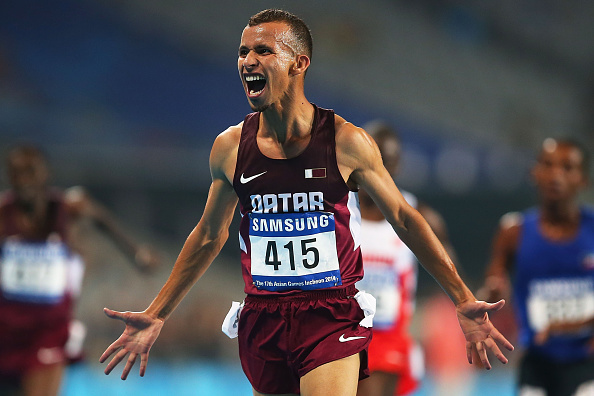 Mohamad Al Garni of Qatar celebrates after claiming the gold medal following the men's 5,000m ©Getty Images
