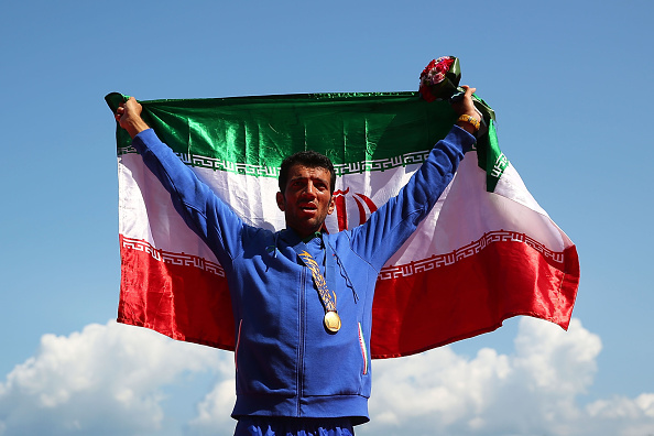 Mohsen Shadinaghadeh of Iran celebrates a nail-biting single sculls rowing victory ©Getty Images