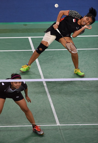 NK Maheswari and G Pollig of Indonesia celebrate the women's doubles badminton gold ©AFP/Getty Images