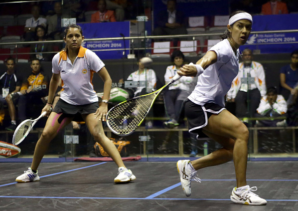 Nicol David (right) en route to a sixth Asian Games squash title for Malaysia in the women's team event ©AFP/Getty Images
