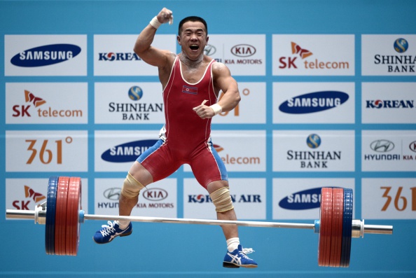 North Korea's Om Yun-Chol sets a world record to claim victory in the under 56kg weightlifting ©AFP/Getty Images