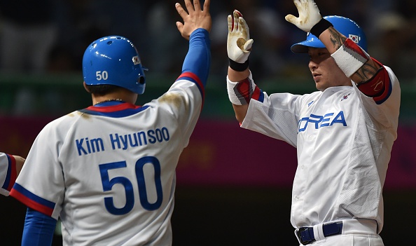 South Korea celebrate victory in the baseball semi-final against China ©Getty Images