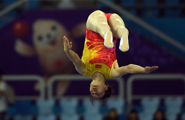 Zhong Xingping of China competes in the women's final for the gymnastics trampoline event ©AFP/Getty Images