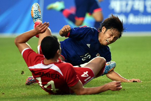 Japan and Palestine contested a place in the quarter-finals of the men's football ©Getty Images