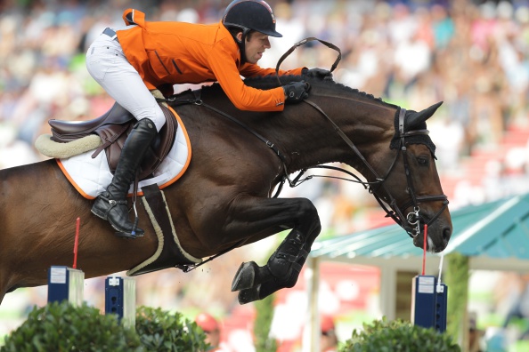 Maikel van der Vleuten helped his team to the jumping title at the World Equestrian Games in Normandy ©AFP/Getty Images