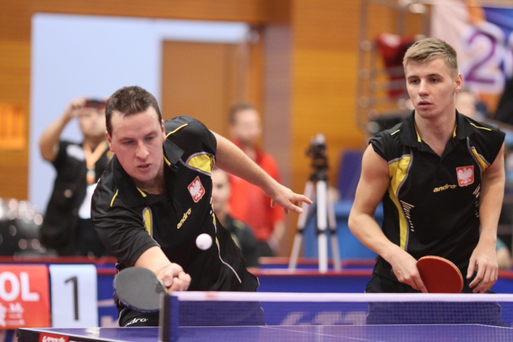 Poland avoided a tough semi-final encounter with China by recording a shock win to top their group in class eight ©ITTF