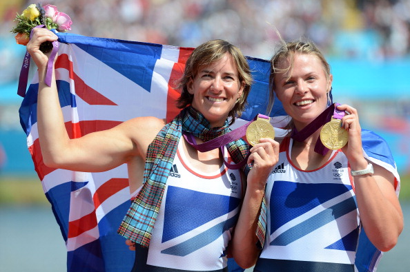 Katherine Grainger (left), pictured with Anna Watkins after winning the double sculls at the London 2012 Games, is back in training with a view to a possible Olympic comeback ©Getty Images