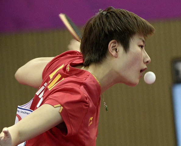 Ding Ning of China helped her team to gold in the women's table tennis ©AFP/Getty Images