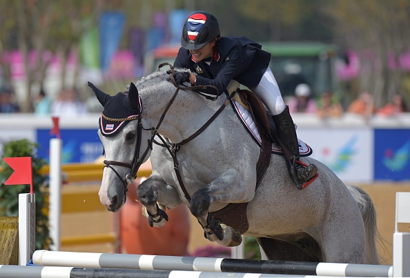 Thailand's Sailub Lertratanachai astride horse Vrauke W was in action in the equestrian jumping individual final ©AFP/Getty Images