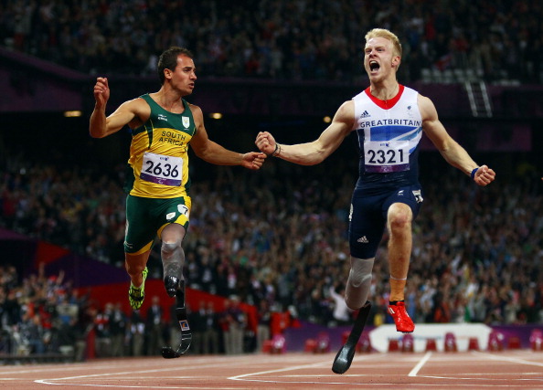 One of Sir Philip Craven's all-time favourite Paralympic moments - Britain's Jonnie Peacock wins the T44 100m at the London 2012 Paralympics ©Getty Images