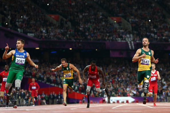 Oscar Pistorius (right) insisted his defeat in the T44 200m at the London 2012 Paralympics was unfair because of the length of the prosthetics used by gold medallist Alan Oliveira (left). Sir Philip Craven felt the reaction had a lot to do with the fact that it was the South African's first defeat at the distance ©Getty Images