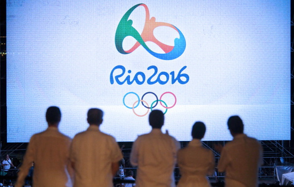 The Rio 2016 logo is launched, with IOC and Rio 2016 officials looking on ©Getty Images