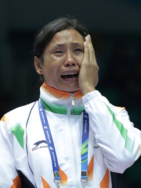 A devastated Sarita Devi refused to accept her bronze medal at the Asian Games in Incheon ©Getty Images