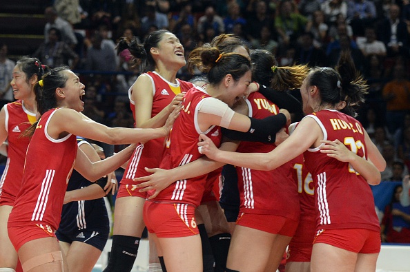 China celebrate following their victory over Italy ©AFP/Getty Images
