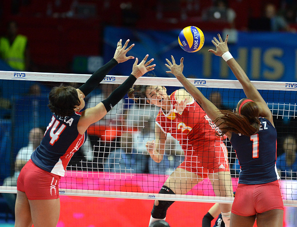 China will have to wait until tomorrow to find out if they have made it into the last four after beating Dominican Republic ©Getty Images for FIVB