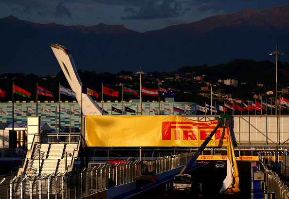 Finishing touches are still being made to the track, with the imposing Olympic Torch seen here in the background ©Getty Images