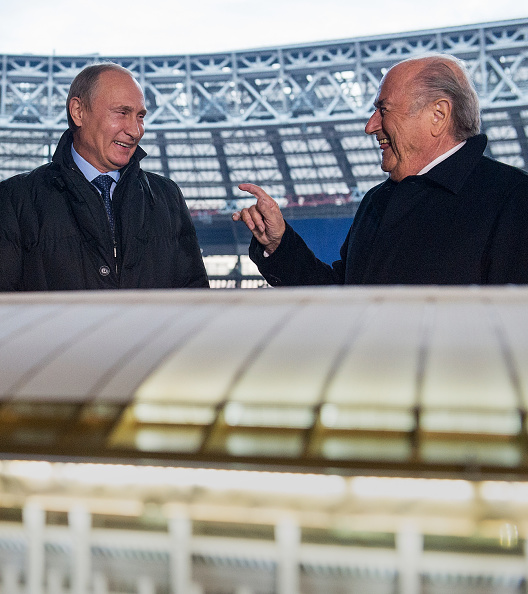 Russian President Vladimir Putin and FIFA President Sepp Blatter observe a reconstruction site of the Luzhniki Stadium in Moscow before the launch of the Russia 2018 emblem ©Getty Images