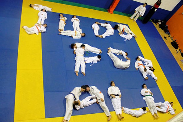 Young judoka spell out the theme of 2012 World Judo Day - judo for all ©IJF