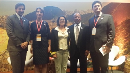 Tania Braga, Rio 2016's head of sustainability, accessibility and legacy, pictured (centre) after the announcement in September of Dow Chemical Company as the Games's official Carbon Partner. Now Rio 2016 has put up its carbon emissions target in terms of mitigation  ©Dow Chemical