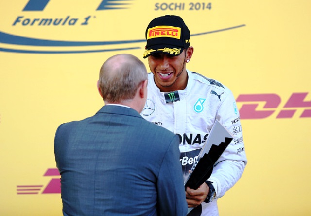 Lewis Hamilton is congratulated by Vladimir Putin after winning the inaugural Russian Grand Prix in Sochi ©Getty Images