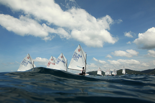 Competitors in the optimist boy class on the opening day of sailing action ©Getty Images