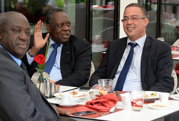 Issa Hayatou, CAF President, speaks to Fouzi Lekjaa (right), President of the Moroccan Football Federation, in early November to discuss the Morocco's request to postpone hosting the 2015 Africa Cup of Nations due to the Ebola epidemic ©Getty Images