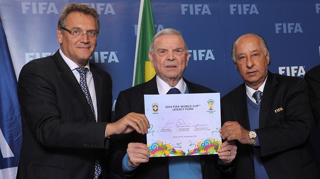FIFA secretary general Jérôme Valcke, CBF President José Maria Marin and CBF President-Elect Marco Polo Del Nero signed an MoU to secure the implementation of a $100 million Legacy Fund from this year's World Cup in Brazil  ©FIFA