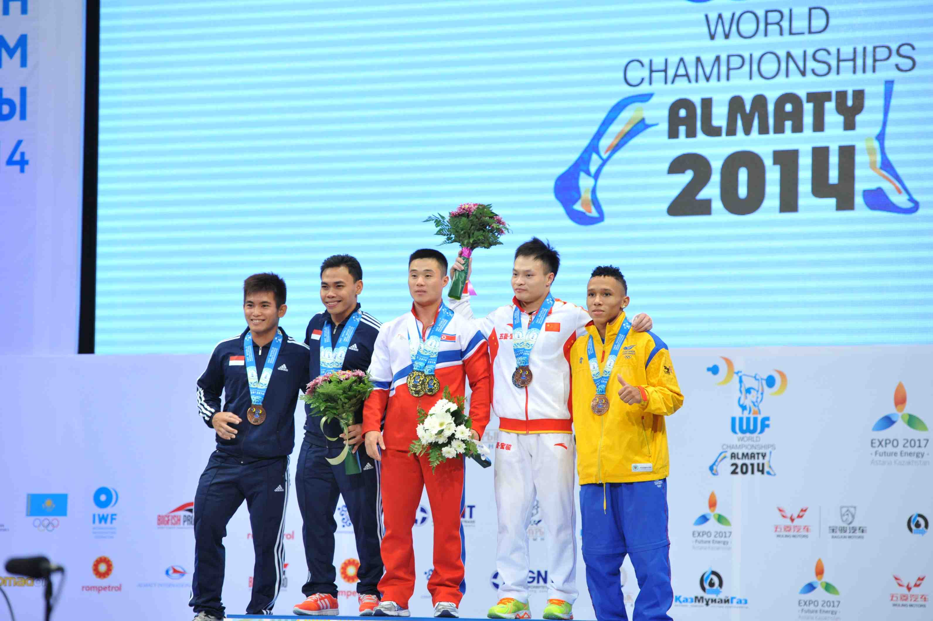 Kim Un Guk totalled 325kg to take the overall gold ©Almaty 2014 