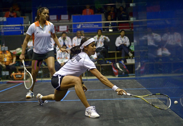 Malaysia's Nicol David (near), the world number one, will be aiming to guide her country to success ©Getty Images