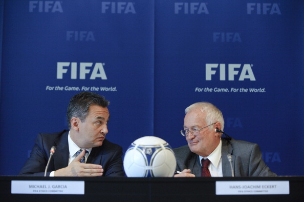 Michael Garcia (left) and Hans-Joachim Eckert (right) met yesterday to discuss the latter's 42-page report, which cleared Russia and Qatar to host the 2018 and 2022 World Cups ©Getty Images