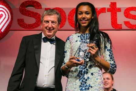 Morgan Lake being presented with SportsAid's One-to-Watch Award by England football manager Roy Hodgson ©SportsAid