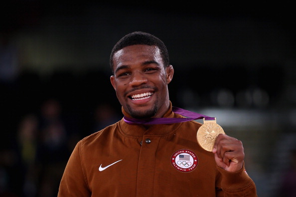 Nike will provide the medal stand uniforms that will be worn on the award podiums and during medal ceremonies at all Games until the end of 2020. Pictured is Jordan Burroughs picking up his wrestling gold at London 2012 ©Getty Images