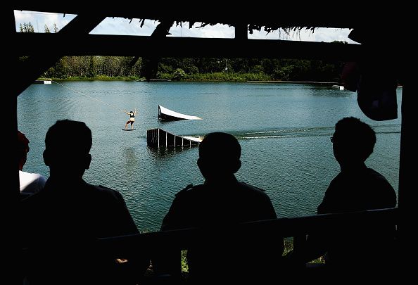 Spectators look on during the cable wakeboarding competition at Bangneow Dam ©Getty Images