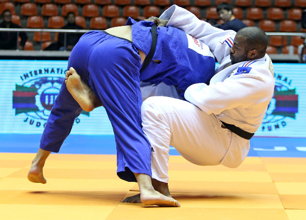 Teddy Riner (right) extended his remarkable unbeaten streak by easing to heavyweight gold in Jeju ©IJF