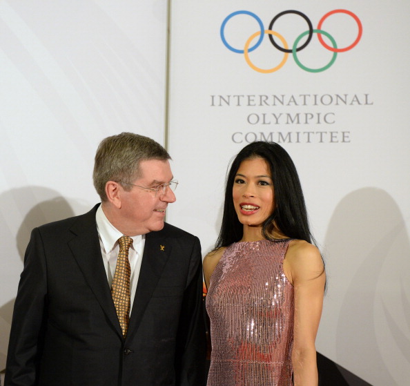Vanessa Mae meeting IOC President Thomas Bach shortly before the beginning of Sochi 2014 ©Getty Images
