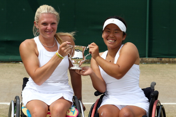 Yui Kamiji (right) and doubles partner Jordanne Whiley (left) face each other on the opening day of the NEC Wheelchair Tennis Masters ©Getty Images