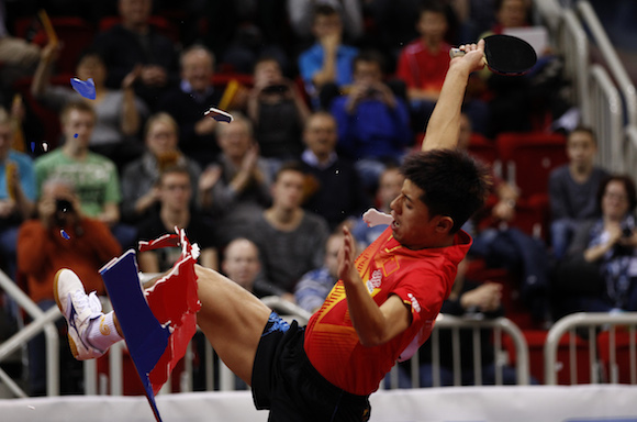 Zhang Jike was stripped of his 2014 World Cup prize money after smashing two advertising boards in an over zealous celebration ©ITTF
