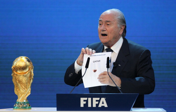 FIFA President Sepp Blatter reveals the hosts of the 2020 World Cup finals as Qatar - giving rise to allegations of corruption, an 18-month inquiry, an announcement of no wrongdoing - and a denial by the author of the report that the announcement accurately reflected it ©AFP/Getty Images