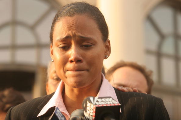 A tearful Marion Jones, multiple Olympic and world sprint champion, speaks to media outside a US courthouse in 2007 after pleading guilty to charges relating to steroid abuse ©Getty Images