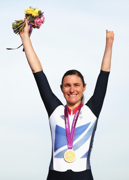 Dame Sarah Storey celebrates one of her four gold medals at the London 2012 Paralympics ©Getty Images