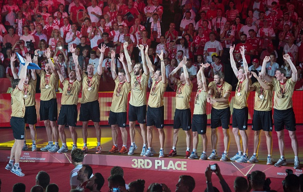 Germany, pictured celebrating their 2014 FIVB World Championship bronze medal, have withdrawn from the FIVB World League in order to focus on Baku 2015 ©AFP/Getty Images