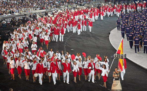 Isabel Fernández leads her country's delegation during the Athens 2004 Opening Ceremony ©Getty Images