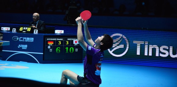 Jun Mizutani of Japan celebrates men's singles gold at the World Tour Grand Finals ©ITTF