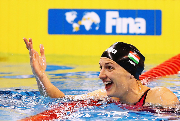 Katinka Hosszú celebrates after breaking the 100 metres backstroke world record in Doha ©Getty Images
