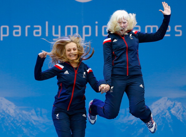 Kelly Gallagher of Great Britain and guide Charlotte Evans following their golden success in Sochi ©Getty Images