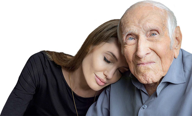 Louis Zamperini with Angelina  Jolie, the Hollywood actress turned director who brought his remarkable life story to the big screen in the film Unbroken ©Universal Studios