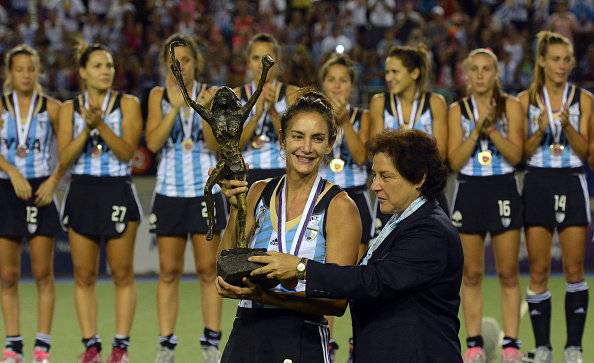 Luciana Aymar holds the Women's Champions Trophy after her last major international tournament ©Getty Images